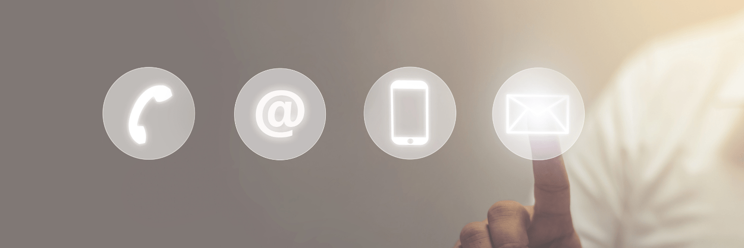 Four circular icons depicting contact methods: phone, at symbol, smartphone, and envelope, with a finger pointing to the envelope.